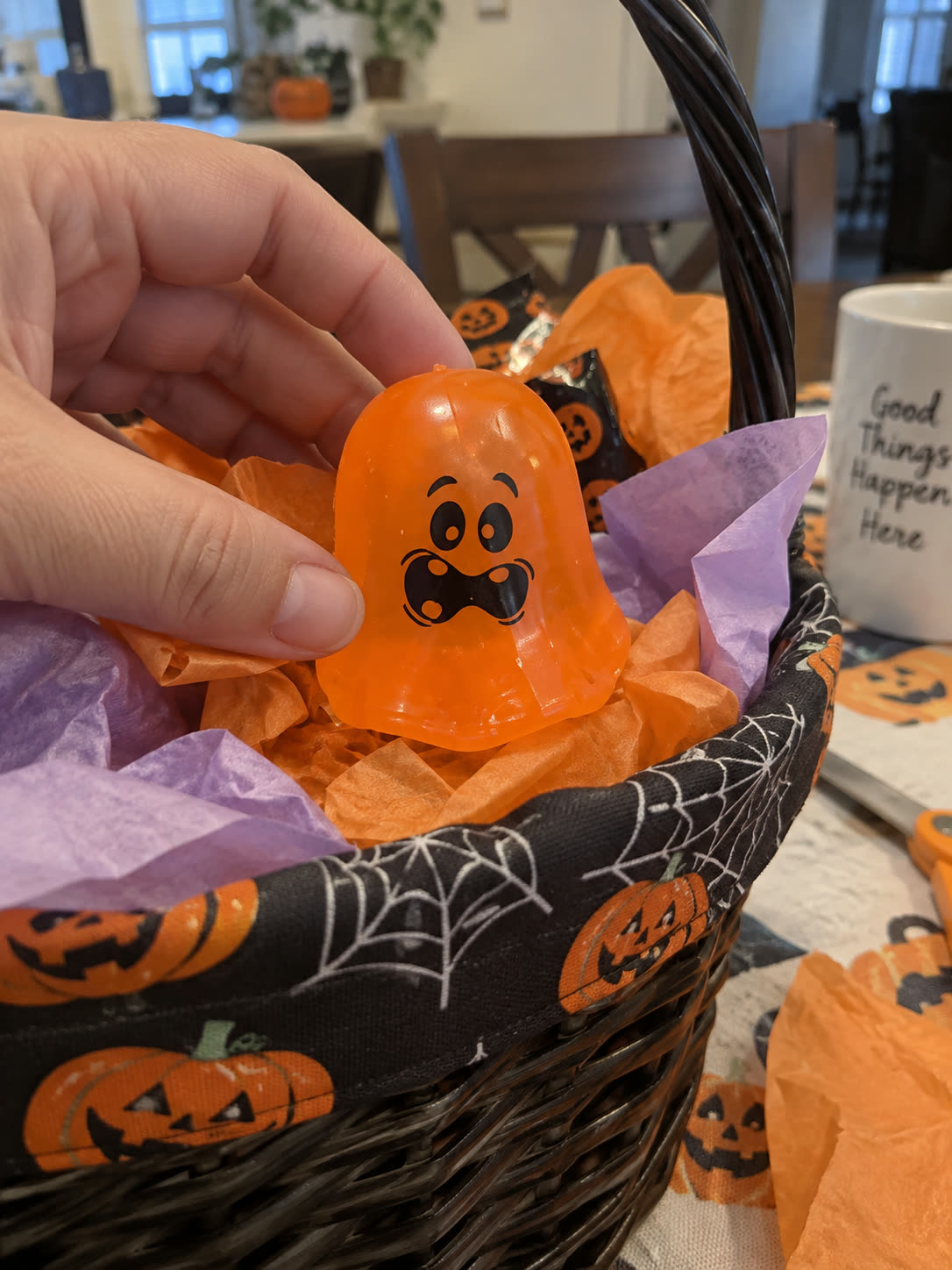 Customer review scene showing the ghost toy inside a Halloween boo basket