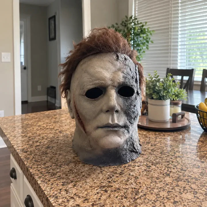 Halloween horror mask close-up on kitchen counter