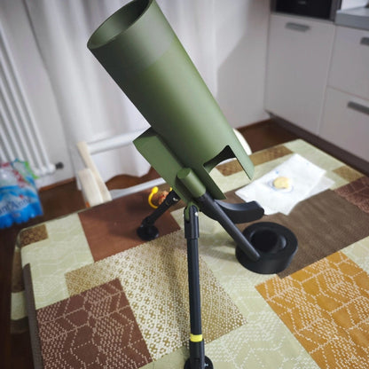 Rear view of the bottle-opening mechanism and tripod base