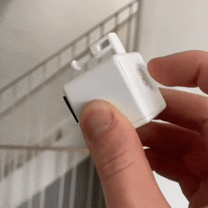 Smart Bluetooth Fingerbot pressing a physical button