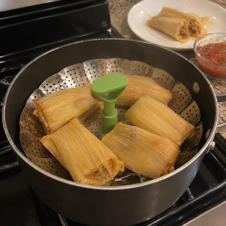 Customer steaming tamales in folding steamer basket