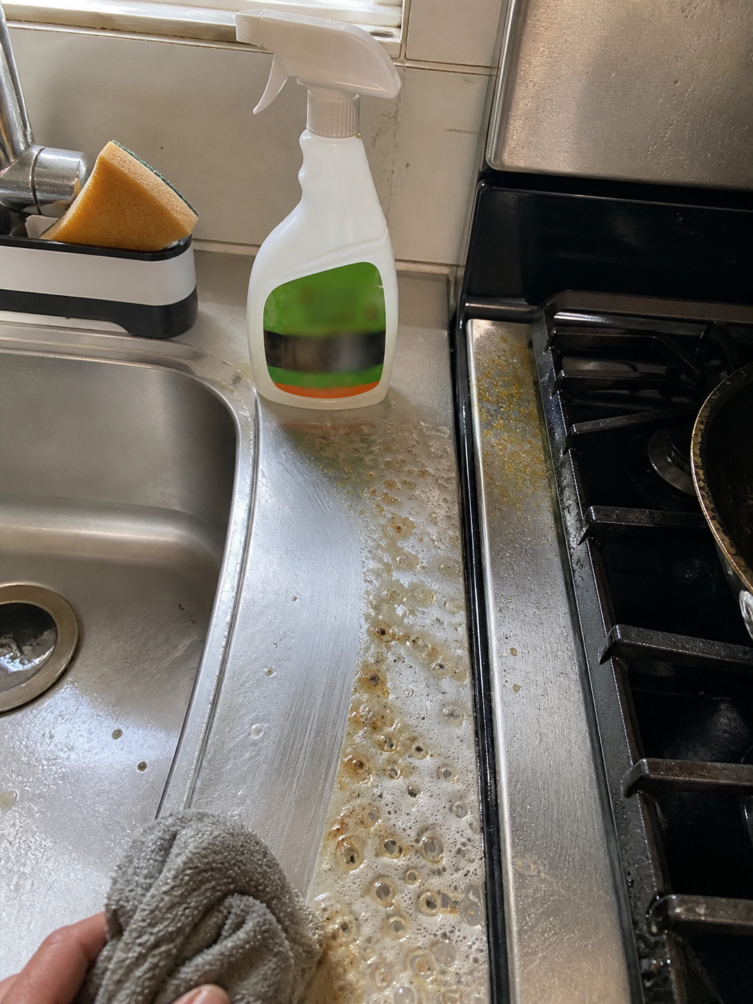 Customer photo showing foaming cleaner on sink-side grease