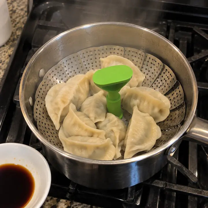 Customer steaming dumplings with foldable basket