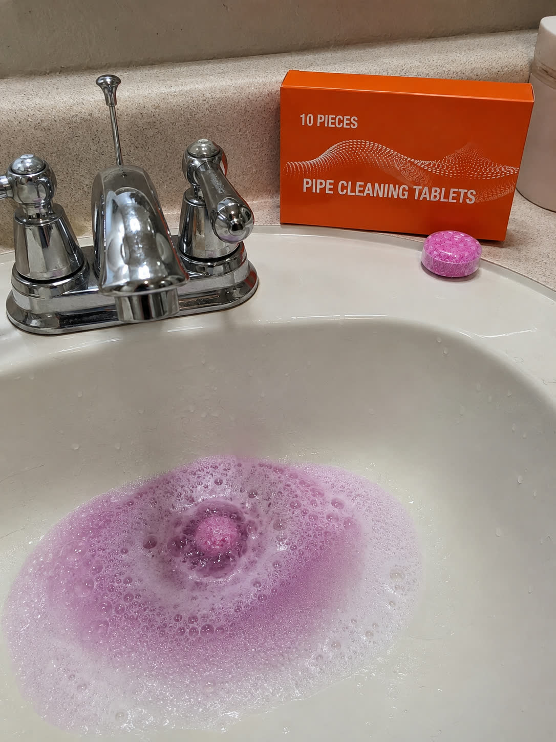 Customer photo showing foaming bathroom sink tablet