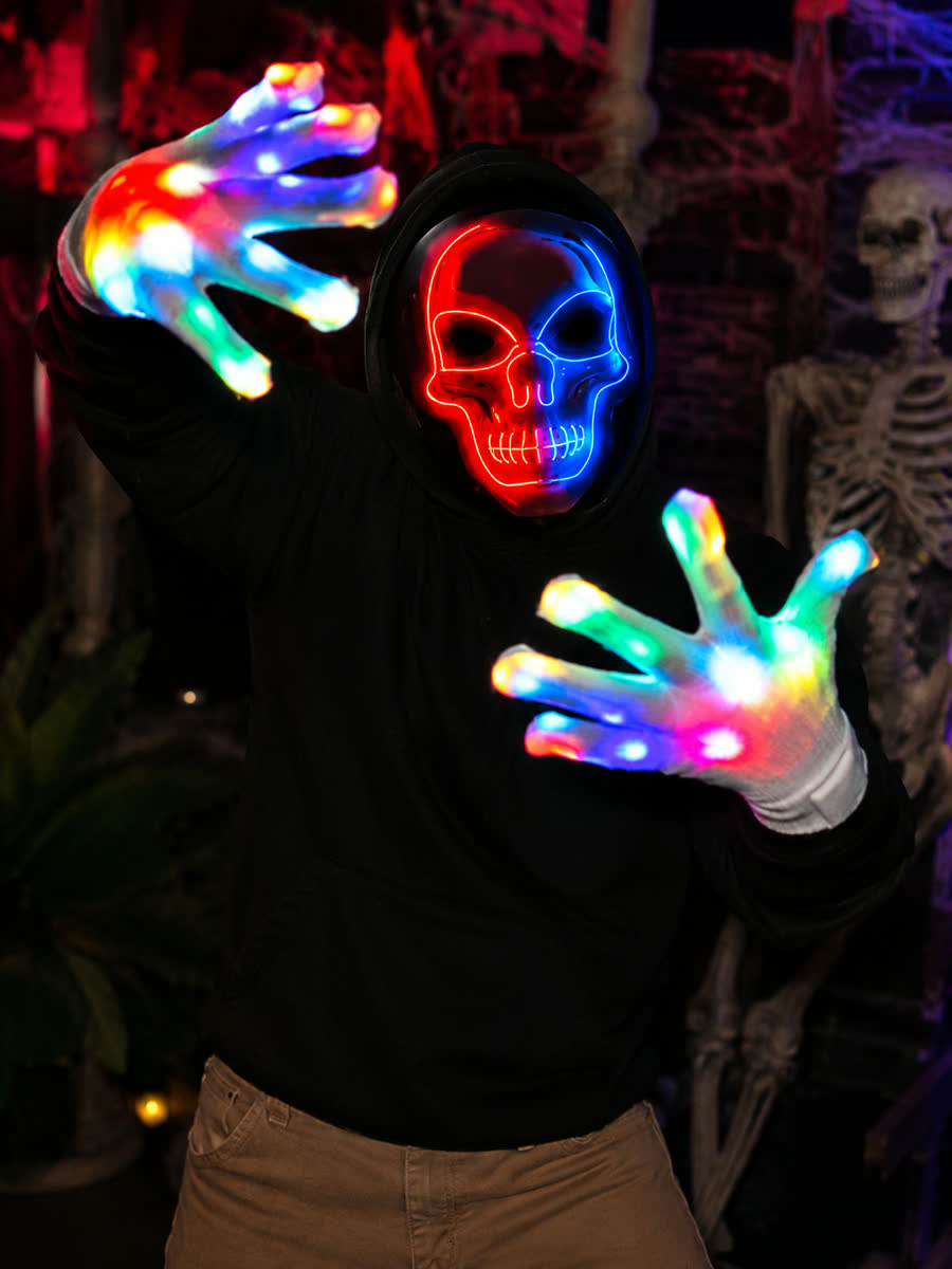 Customer showing the LED glow skull mask and light-up gloves in a Halloween scene