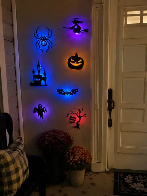 Customer doorway wall decorated with glowing Halloween silhouette lights