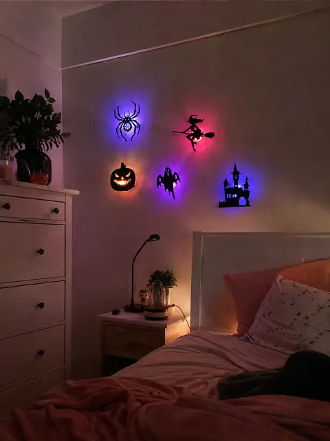 Customer bedroom wall with glowing Halloween silhouette lights