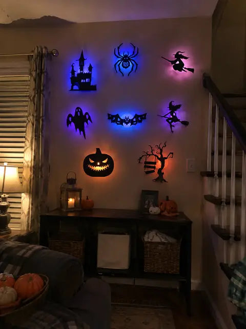 Customer living room wall decorated with glowing Halloween silhouette lights