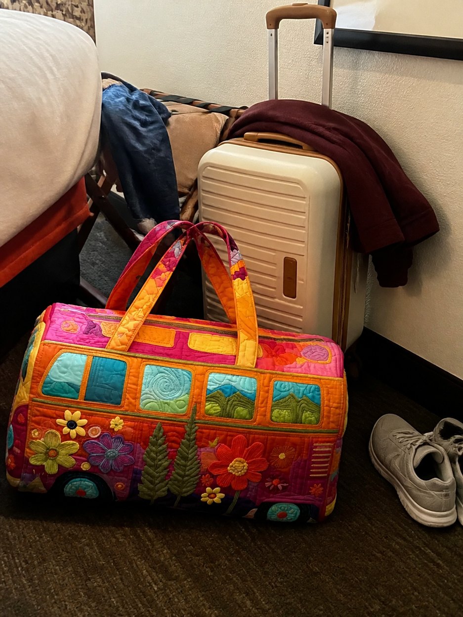 George H. boho weekender in a hotel travel corner