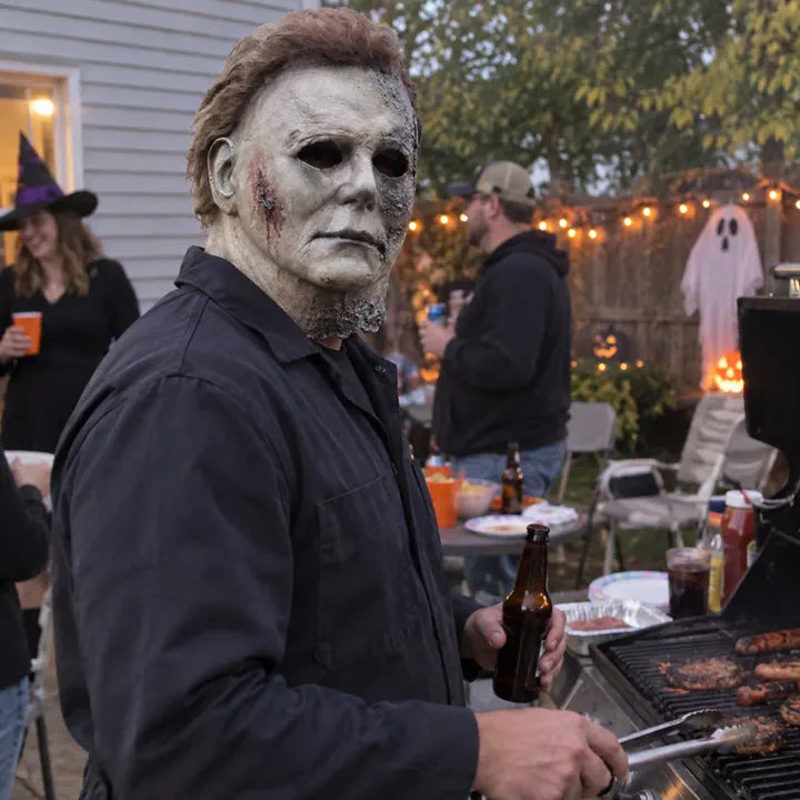 Halloween horror mask at backyard party grill