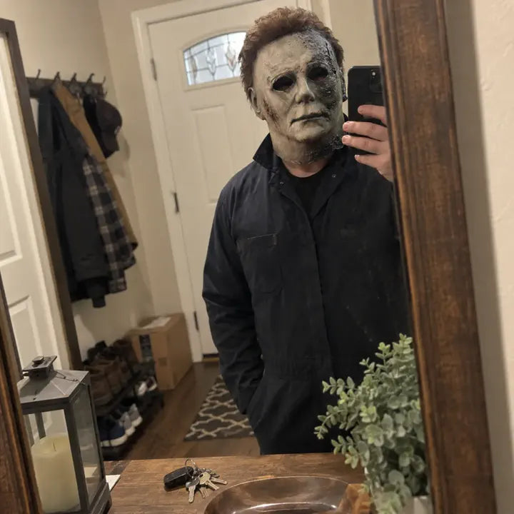 Mirror selfie wearing Halloween horror mask