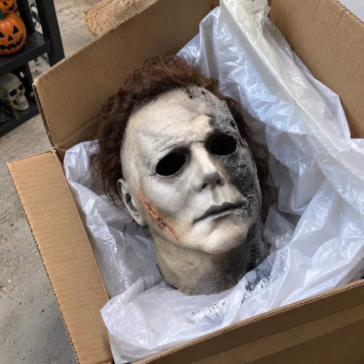 Halloween horror mask unboxed from shipping box