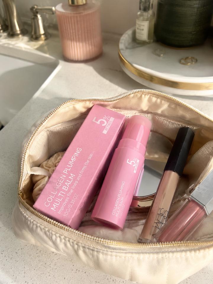 Customer review photo showing PDRN multi balm in a makeup bag for before-makeup touch-ups