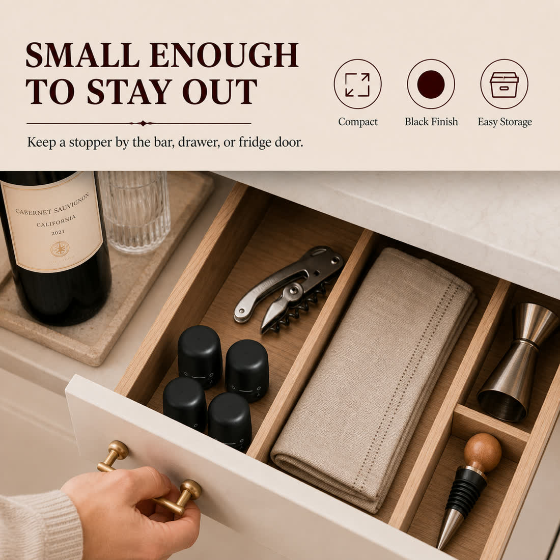 Compact black wine stoppers stored in kitchen drawer